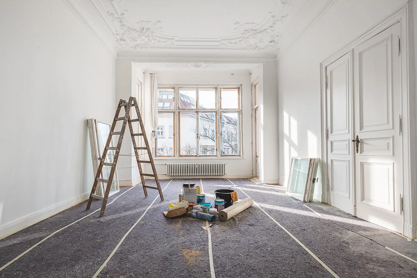 Decorating work in progress with ladder and tools