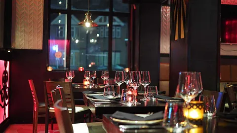 Commercial restaurant interior with pendant lighting